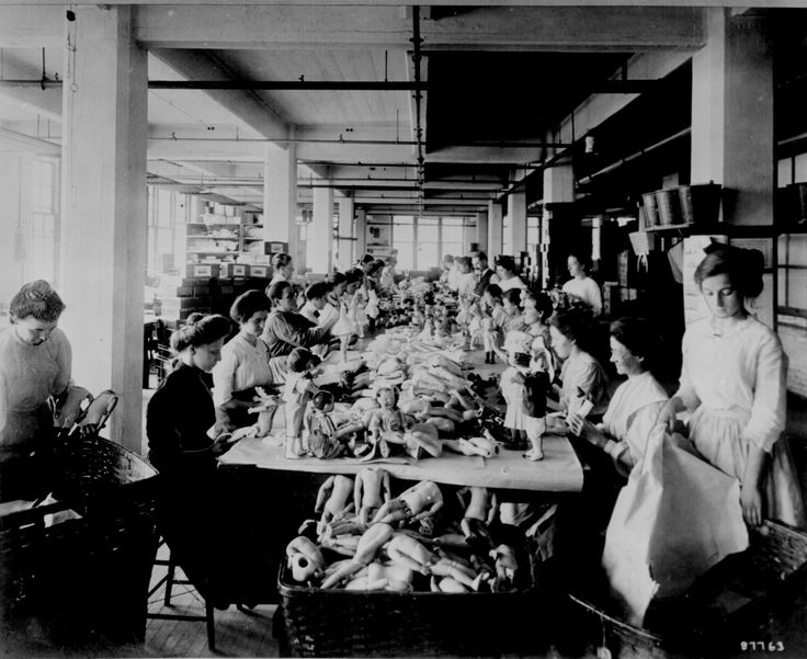 Women assembling dolls on a long worktable at the Shrenhat Toy Company, Philadelphia, Oct. 1912. (History By Zim).jpg