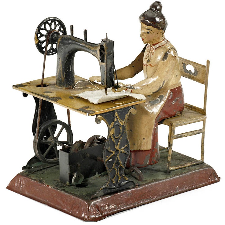 Woman on Sewing Machine, c. 1905.jpg